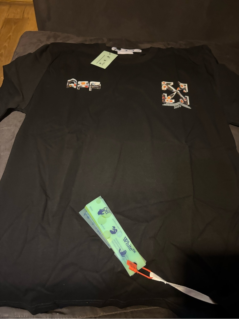 Off-White Black Short-Sleeve Tee with Floral Logo Accents